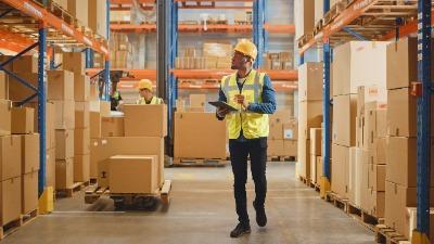 Man takes inventory of warehous supply chain